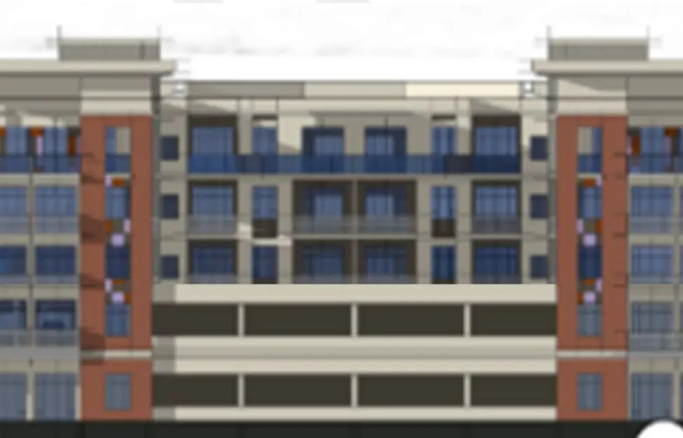 Modern multi-story residential building with balconies and large windows.